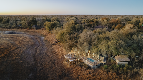 Wilderness Savuti is situated in the private Linyanti Wildlife Reserve along the Savuti Channel, famous as a sporadic and unusual watercourse. As part of a natural cycle, the waters of the Savuti either flow strongly – a magnet for thirsty wildlife – or recede to leave behind a rich grassland. 

Wilderness Savuti provides front-row seats to amazing wildlife viewing perched high on the banks of the channel. The camp looks down on a miraculous ribbon of territory where both plains game and predators thrive, and exploring the length of this channel and its associated woodlands is thus a highlight here. 

The intimate camp's en-suite accommodation is in six canvas-and-thatch tents (including a family unit). From the camp's thatched dining area, elevated wooden decks extend out over the channel bed, with a small pool, fire deck and wonderful views over the channel.

Insider’s Tip: The Savuti Star Bed with a sublime location overlooking the Savuti Channel and facing Zibadianja Lagoon to the west. Intimate encounters with iconic wildlife parading in the channel, as the Milky Way dances across an inky African sky. It is the perfect spot to end a magical day on safari, as the calls of the wild soothe you to sleep.
