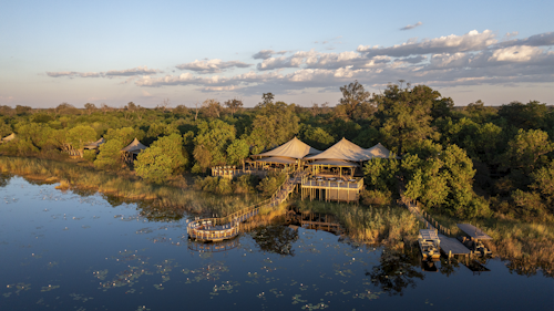 Wilderness DumaTau’s extensive lagoon frontage ensures that each ultra-spacious 142 m2 guest suite has uninterrupted views over Osprey Lagoon, and the movements of the mega-herds of elephants the Linyanti is so famous for.

All seven twin tented suites and one family unit have a private plunge pool and an inviting lounge, and feature a spacious bathroom with indoor and outdoor showers. The main dining and lounge areas boast unimpeded wide-angle vistas overlooking the wildlife-rich lagoon, while the centrally located Osprey Retreat wellness centre and gym – shared with Wilderness Little DumaTau – includes an inviting shaded deck, a lap pool, spa, a drinks and snack counter, and Safari Boutique. Wilderness DumaTau runs on 100% solar energy.

Insider’s Tip: The Linyanti is recognised as an IBA (Important Bird Area), so the hides and platforms in the area are ideal for bird watching and photographing wildlife.
