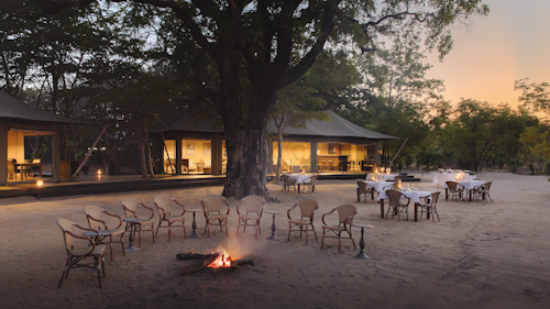 A charming, intimate camp in the south-east of Hwange, Wilderness Little Makalolo features prominently on the mental maps of local wildlife, all drawn to its reliable waterhole. A log-pile hide affords unique, thrilling close-up views of elephants, and habitat diversity ensures year-round wildlife.

Activities focus on game drives and morning nature walks. The many waterholes produce amazing sightings, or guests can relax in camp and wait for wildlife to come to them. The six spacious en-suite tents (including a family tent) are only surpassed in the experience stakes by the opportunity to sleep out at the Madison Pan star bed. 

Insider's Tip: Visit the log-pile hide between game drives to enjoy close up viewing of wildlife at the productive waterhole. Elephants are often the star attraction so make sure you have your camera ready ...