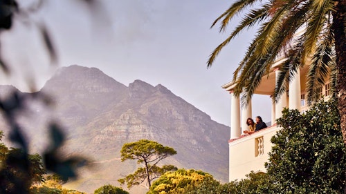 Timeless and authentic, the iconic Mount Nelson Hotel is set between the slopes of Table Mountain and the city of Cape Town. Its striking architecture and unique interior design reflect a fusion of décor concepts, from colonial to modern contemporary. Rooms are spacious and luxurious, and contrast well against the bold exteriors through the use of subtle tones and textures. Enjoy time at the pool, stroll around the rose gardens and relax in one of the many lounge spaces. For a truly indulgent experience, try out a spa treatment followed by a spectacular afternoon tea. The Planet Bar and Restaurant provide a true South African gastronomic experience. 

INSIDER’S TIP: A garden picnic is a special way to remember your stay at the famous ‘Pink Lady’. 