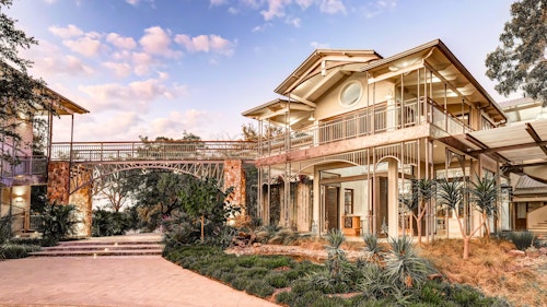 Set along the banks of the Zambezi River, and only four kilometres from Victoria Falls, The Palm River Hotel is all about comfort, and incredible views. Dark wood set against the warm tones of the exteriors adds a touch of post-colonial flair to the main areas and veranda, which overlooks the river. Each room has its own personality and offers views of the swiftly flowing Zambezi, opening onto the lush gardens. Take a moment to cool off in the modern 34 m infinity swimming pool, which is eye level with the riverfront, and adjacent to a lap pool and shallow splash pool. Meals served at the restaurant are a delectable fusion of local and international flavours. As an afternoon activity, taking a sundowner cruise is a wonderful way to spot birds, and see large pods of hippos.

Insider's Tip: Book a private dining experience in the garden overlooking the mighty Zambezi.
