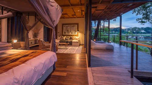 The name Qorokwe means 'the place where the buffalo broke through the bush into the water' and is evocative of the high-density game area in which the camp is situated. The diverse habitats of the south-eastern Okavango support a wealth of wildlife, earning the area’s well-deserved reputation as a top Botswana safari destination. 

Wilderness Qorokwe has nine tented suites, one of which is a spacious family unit with a private plunge pool. En-suite facilities feature an indoor shower with an inward opening door giving the illusion of an outdoor shower experience. Built on elevated wooden platforms, the main area includes a dining room, lounge, library, bar and an infinity pool overlooking the grassy plains. Highlights of Wilderness Qorokwe’s dining experiences include festive boma evenings and scrumptious pizzas from the camp’s bespoke oven. 

Insider’s Tip: Keep a look out for the secretive white rhino which have been reintroduced into this area. 


