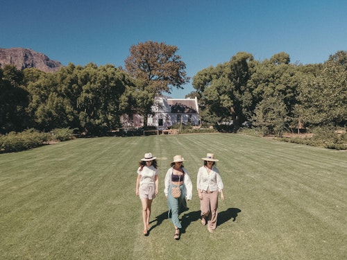 Spend an enchanting day exploring the picturesque Cape Winelands, where vine-blanketed hills and quaint historical towns await. Your journey will take you through some of the country's top wine farms, restaurants, and boutiques. With your guide selecting wine estates and a restaurant tailored to your specific tastes, you'll also have the opportunity to explore artistic, botanical, historical, or cultural sites that pique your interest.

The region's mineral-rich soils, mountains, and diverse microclimates create the perfect conditions for producing world-class wines. With a winemaking tradition dating back to the 17th century French Huguenots, combined with modern techniques, a new generation of winemakers is crafting exceptional wines. Enjoy the rich flavours and captivating stories behind each bottle as you immerse yourself in the beauty and history of the Cape Winelands.