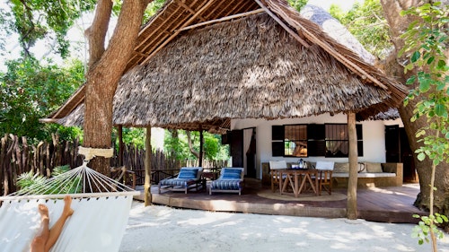 Occupying an idyllic spot on the stunning Galu Beach, Kinondo Kwetu is a boutique beachfront resort that will perfectly position you to discover Kenya's dazzling south coast. Composed of just 15 well-appointed rooms and bungalows, the hotel showcases a captivating combination of both modern and traditional African design. Beds are draped with mosquito nets and most rooms feature a balcony or a veranda with sea or garden views. Thanks to the coast's wonderful climate, you can look forward to enjoying your meals outside on the beach or in the garden, accompanied by a vintage from the resort's especially selected wine list. Kinondo-Kwetu offers its guests its own private beach area from where a whole host of water-sports can be arranged, from kayaking and waterskiing, to snorkeling, scuba diving, sailing, and deep sea fishing. After a day spent in the sea, relax in the spa or wind down with a yoga or Pilates class. Venture out of the resort, and you'll find that the Shimba Hills National Park is just a 45-minutes drive away.