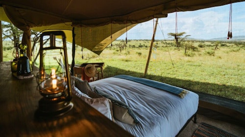 Imagine endless horizons, skies stretching over the grassland as far as the eye can see … 

Every species in the Serengeti lives in perfect harmony with the one beside it. It is this balance, ‘usawa’ in Kiswahili, that ensures this phenomenal ecosystem functions in perfect symbiosis. 

In northern Tanzania, Africa’s greatest spectacle unfolds. Two million wildebeest, zebra, Thomson’s gazelle, eland and other migratory animals graze, breed, and birth on the Serengeti’s plains; following the rains, moving as one. Prides of lion split the herds, taking down wildebeest and zebra. Cheetah chase down and tyre out gazelles while crocodiles prey on the brave; those who dare to cross the rivers first. This scale of wildlife, of predator-prey interaction is found nowhere else on Earth.  

Far from the crowds, Wilderness Usawa Serengeti's mobile camps are strategically located, moving to areas where the herds are as they follow the rain. With a number of sites available, positioned as close as is feasible to the action, in luxurious safari tents that leave no impact on the plains. 

Insider's Tip: Pack your walking shoes. All Wilderness Usawa Serengeti sites are positioned within designated walking zones, allowing walking safaris to begin right from camp.