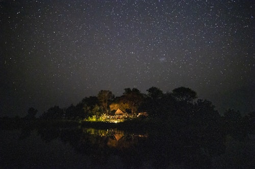 Shinde Camp is nestled on a lush palm island in the heart of the northern Okavango Delta, on the edge of Shinde lagoon. A diverse range of activities are offered throughout the year, including boating mekoro excursions, game drives, guided and fly fishing. Accommodation comprises eight twin-bedded classic safari tents with en-suite bathrooms, hot and cold running water and a flush toilet. Each tent is strategically positioned to offer either splendid views across the Delta’s mysterious waterways or open grasslands. Accommodation is generally set up as twins on comfortable three-quarter beds, but doubles are available on request. The main building offers a swimming pool, lounge / library, bar and shop facilities as well as phone, fax and email.

INSIDER’S TIP: The Okavango Delta was named as UNESCO’s 1000th World Heritage Site in 2014.