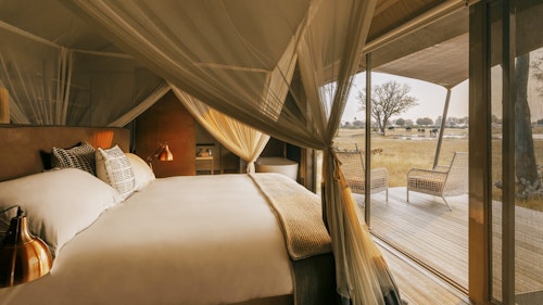 Wilderness Linkwasha is a luxurious camp that lies in a private concession in the enormously productive south-eastern corner of Hwange National Park. Situated on the edge of the famed Ngamo Plains, which offers fantastic summer game viewing, the camp looks over a magnificent plain and a pan that is a magnet for game year round, especially in the dry winter months.

The fresh, open and airy design of Wilderness Linkwasha is complemented by an eclectic mix of contemporary interiors. Nine luxurious en-suite tents (eight twins and one family unit) offer incredible views, while the main area – including multi-level decks, a pool area and a winter lounge complete with library – overlooks the prolific waterhole.

Insider’s Tip: Enjoy the thrill of getting your feet on the ground on a walking safari in the company of Wilderness Linkwasha’s knowledgeable and highly experienced safari guides. 
