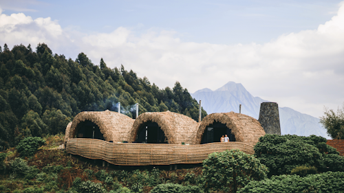 On the edge of Volcanoes National Park, one of the world’s premier destinations for viewing mountain gorillas, Wilderness Bisate Reserve offers an unparalleled 360-degree panoramic view of the rainforested slopes of six majestic, extinct volcanoes. 

The sister to the renowned Wilderness Bisate, this camp is no doubt now the grandest way to see the gorillas. Home to just four sublime en-suite villas, each with expansive living areas, viewing decks and private hot tubs, it promises unrivalled privacy and exclusivity. 

While spending an hour with the mountain gorillas is no doubt the star attraction, there are many other thrilling encounters that await discerning connoisseurs of conservation – from golden monkey trekking to climbing Mount Bisoke, hiking to the ruin of Dian Fossey’s Research Centre and visiting the Ellen DeGeneres Campus of the Dian Fossey Gorilla Fund.

Insider's Tip: Arrive early or stay later, and take advantage of the Bisate Kwanda Day Lounge; explore the lush gardens, enjoy a light meal at the restaurant, browse the boutique for a hand-crafted memento or have a massage or shower in one of the private en-suite relaxation rooms.
