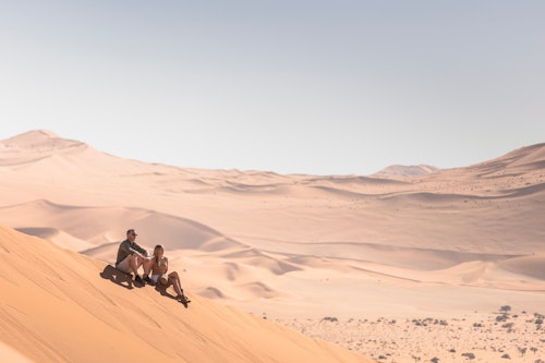 Exploring Sossusvlei with Wilderness comes with the unique privilege of exclusive access through a private gate, allowing you to be among the very first to reach the towering red dunes. Climb iconic Dune 45 or Big Daddy before descending into the pans of Deadvlei, where ancient camelthorn trees stand stark against the sand. 

After returning to camp for a leisurely brunch, your day can continue with guided nature drives, keeping an eye out for springbok, oryx, and ostrich, or on foot with interpretive walks that reveal the desert’s smaller wonders. For those seeking adventure, quad biking and fat biking provide an exhilarating way to explore the world's oldest desert. Evenings bring a slower rhythm, with sundowners and stargazing in some of the clearest night skies on Earth.