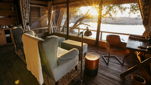 Wilderness King's Pool consistently delivers the best dry season game viewing in far northern Botswana. Situated on the border with Namibia’s Caprivi Strip, Wilderness King's Pool is in an area vital to the seasonal movements of elephant herds and to the survival of rare roan and sable antelope. Looking down over the Linyanti River and up from the safety of sunken hides gives guests unexpected angles from which to witness great wildlife moments.

Seven well-appointed twins and one family room, all made of canvas, wood and, thatch, soak up the views of the lagoon. The main area, deck, and bar offer uninterrupted views with closer proximity to the water, while parts of the roof extend down to ensure privacy.

Insider’s Tip: Special highlights include sundowners on the Queen Silvia barge and time out at the unique underground hide!
 
