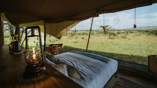 Imagine endless horizons, skies stretching over the grassland as far as the eye can see … 

Every species in the Serengeti lives in perfect harmony with the one beside it. It is this balance, ‘usawa’ in Kiswahili, that ensures this phenomenal ecosystem functions in perfect symbiosis. 

In northern Tanzania, Africa’s greatest spectacle unfolds. Two million wildebeest, zebra, Thomson’s gazelle, eland and other migratory animals graze, breed, and birth on the Serengeti’s plains; following the rains, moving as one. Prides of lion split the herds, taking down wildebeest and zebra. Cheetah chase down and tire out gazelles while crocodiles prey on the brave; those who dare to cross the rivers first. This scale of wildlife, of predator-prey interaction is found nowhere else on Earth.  

Far from the crowds, Wilderness Usawa Serengeti's mobile camps are strategically located, moving to areas where the herds are as they follow the rain. With a number of sites available, positioned as close as is feasible to the action, in luxurious safari tents that leave no impact on the plains. 

Insider's Tip: Pack your walking shoes. All Wilderness Usawa Serengeti sites are positioned within designated walking zones, allowing walking safaris to begin right from camp.